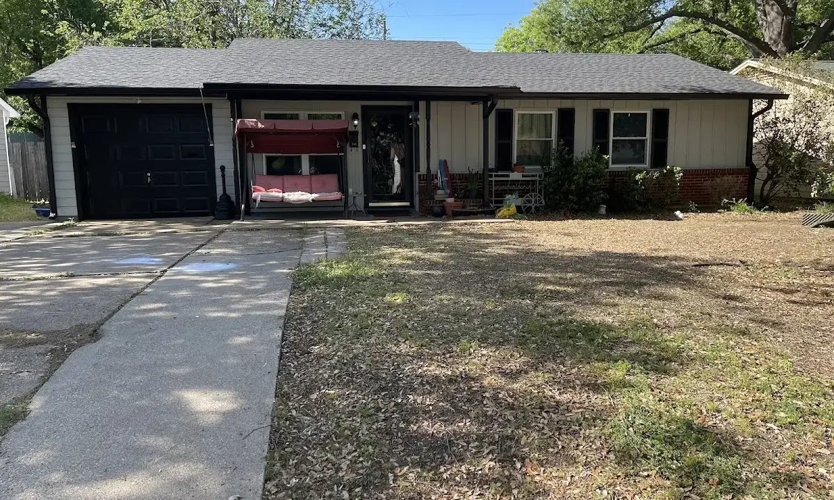Hail Damage Roof Repair crew at work on a residential roof in Glennville